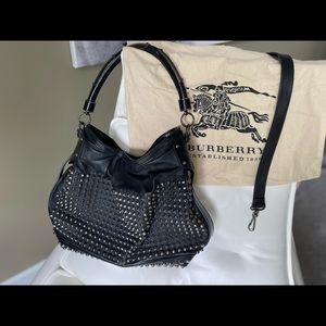Burberry shoulder bag in black leather with studded accents.Two straps included.